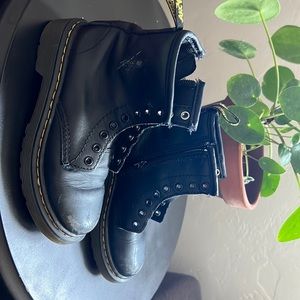 Dr. Martens boots still in good condition. Scraped at the front of the boots.